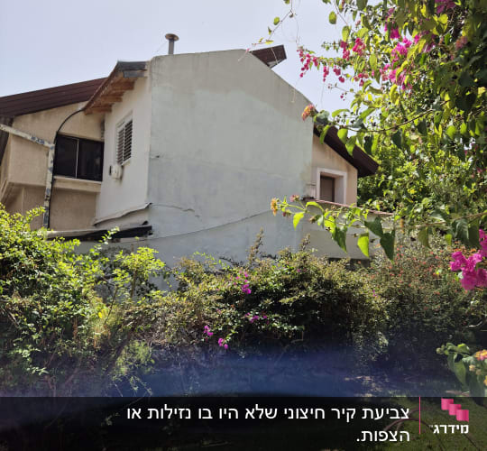 קיר חיצוני של בית עם איטום חדש